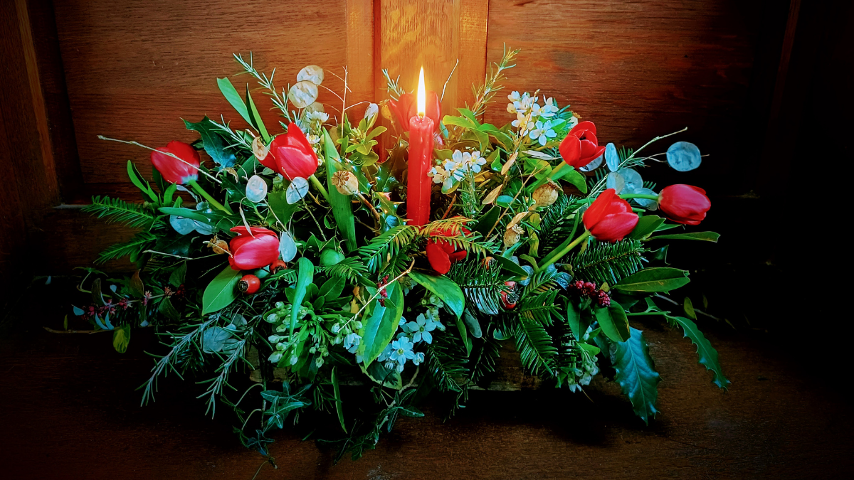 A christmas centrepiece with candle